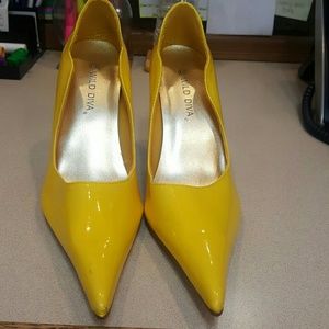 Yellow high heels